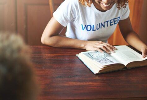Shot of a volunteer reading